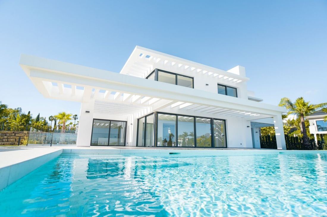 Modern white villa with pool